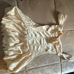 Elegant Cream Dress with Ruffled Skirt